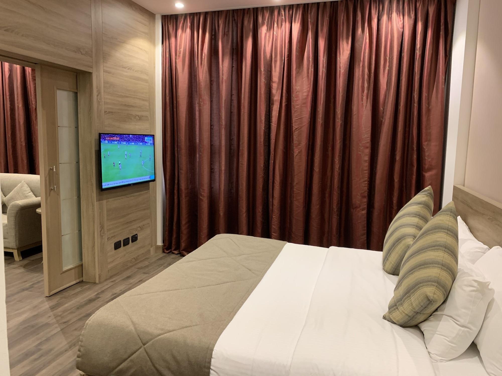 โรงแรมคาร์ลตันอัลโมไอเบด ดัมมัม ภายนอก รูปภาพ A bedroom in the hotel