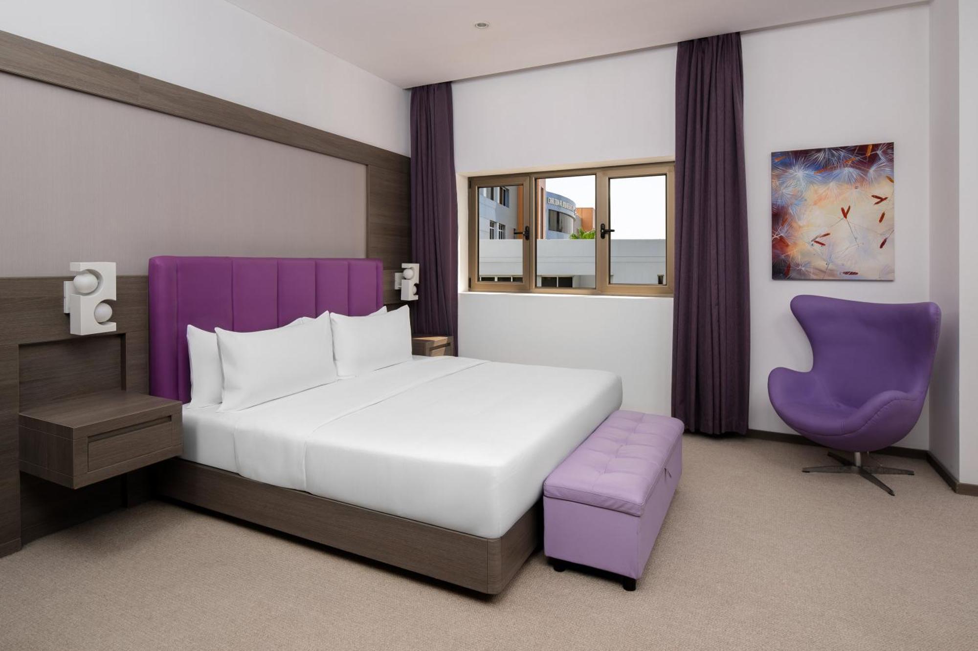โรงแรมคาร์ลตันอัลโมไอเบด ดัมมัม ภายนอก รูปภาพ A bedroom at the hotel