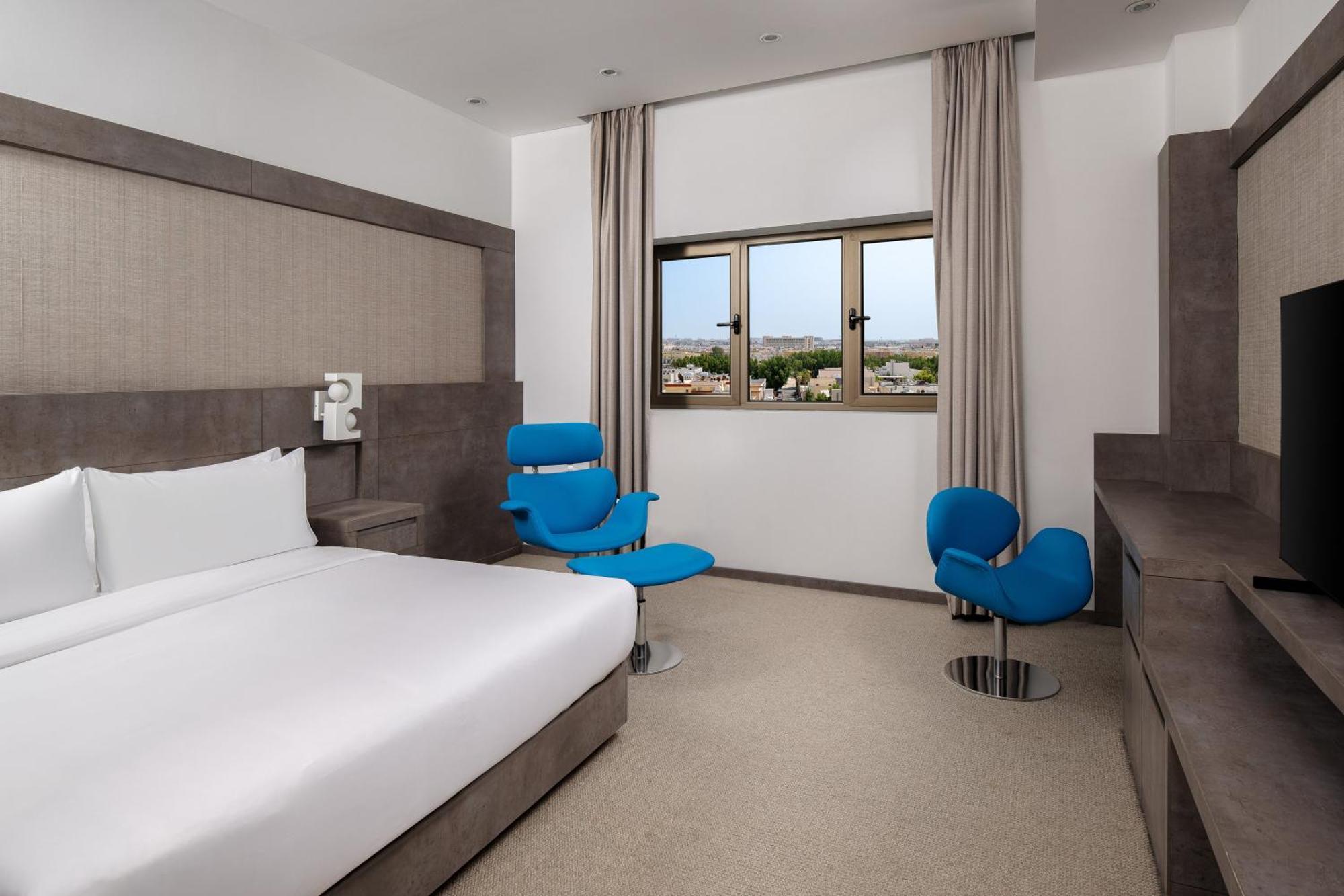 โรงแรมคาร์ลตันอัลโมไอเบด ดัมมัม ภายนอก รูปภาพ A room at the hotel