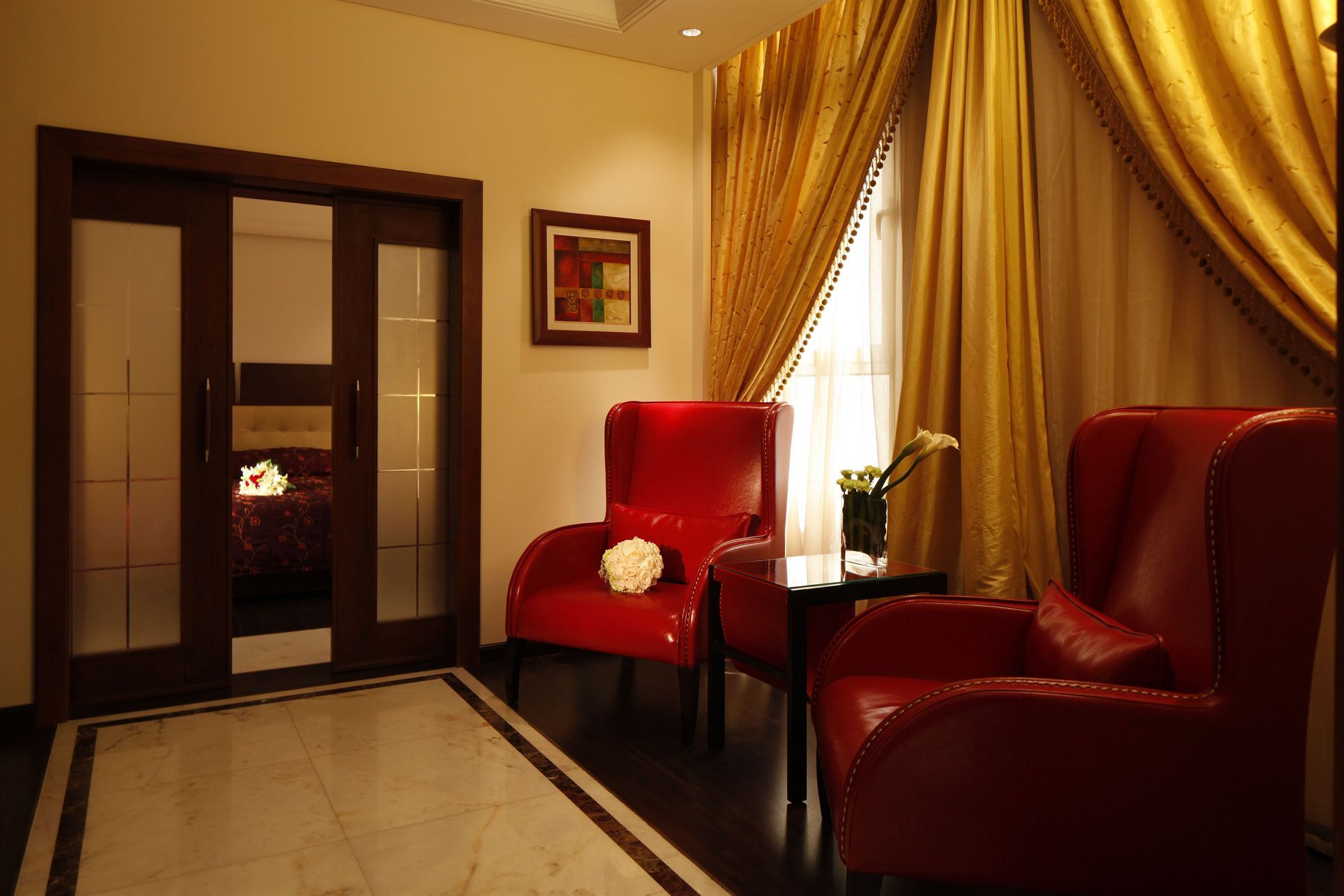 โรงแรมคาร์ลตันอัลโมไอเบด ดัมมัม ภายนอก รูปภาพ A suite at the hotel